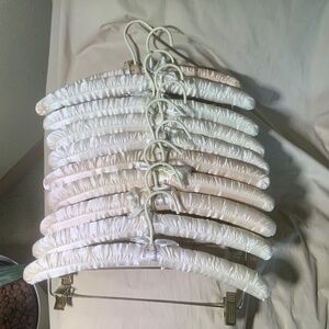 10.  15.5 PADDED SATIN HANGERS WITH CLIPS